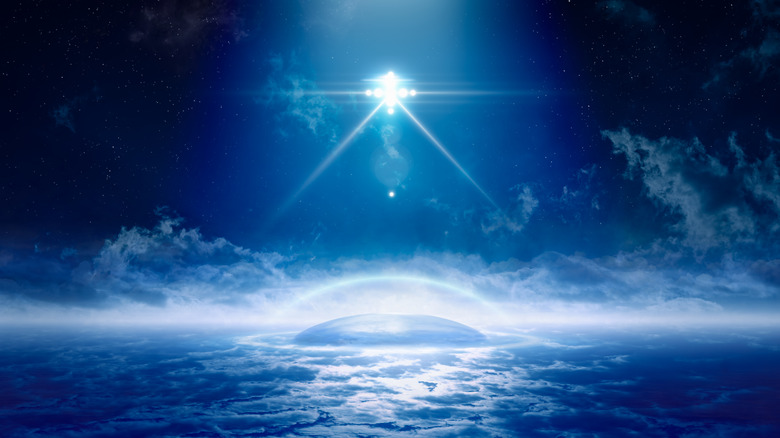 spaceship flying over Earth