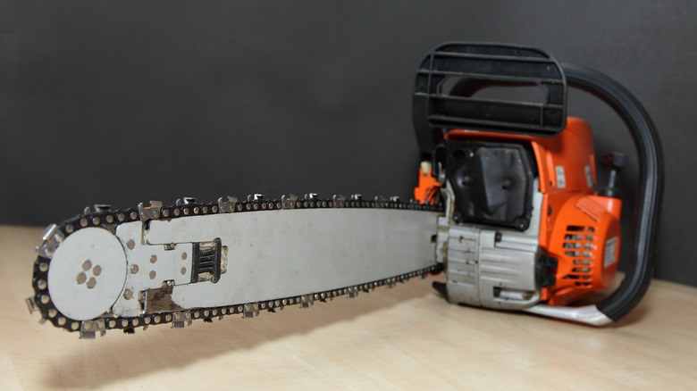 Chainsaw sitting on table