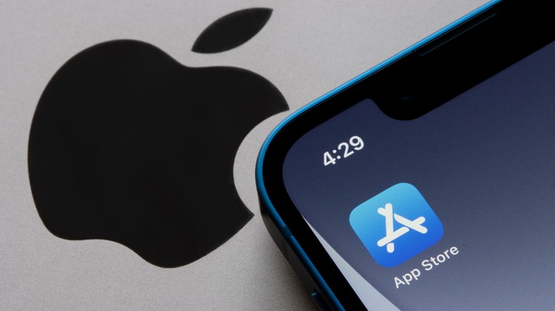 Apple App Store icon on phone screen