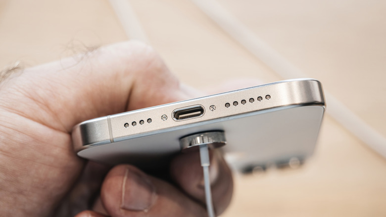 Closeup of an iPhone's speakers and charging port