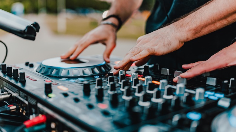 DJ mixing outdoors