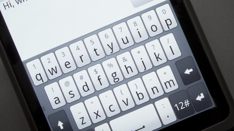 smartphone screen displaying a digital keyboard