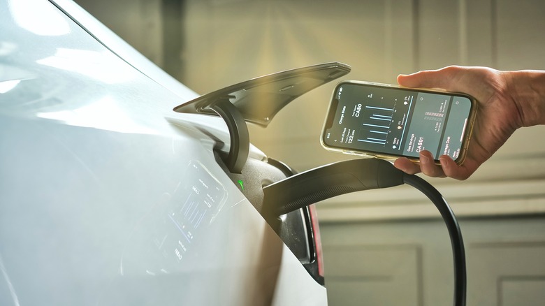 Tesla app next to EV