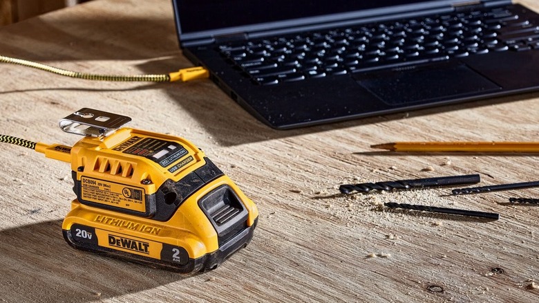 DeWalt battery plugged into laptop