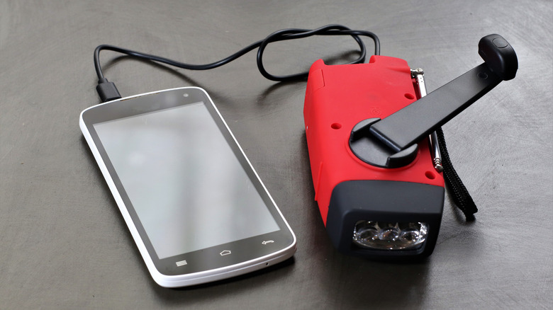 Smartphone with hand crank charger
