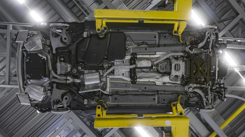 underside of vehicle shown on garage lift