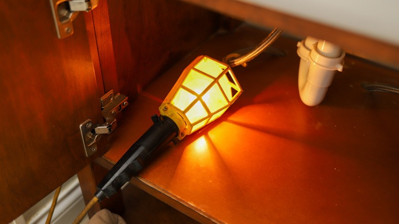 Handheld light in a tight space