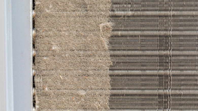 Air conditioning coils clogged with dirt an debris