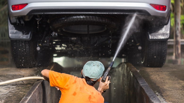 Power wash spray undercarriage clean car