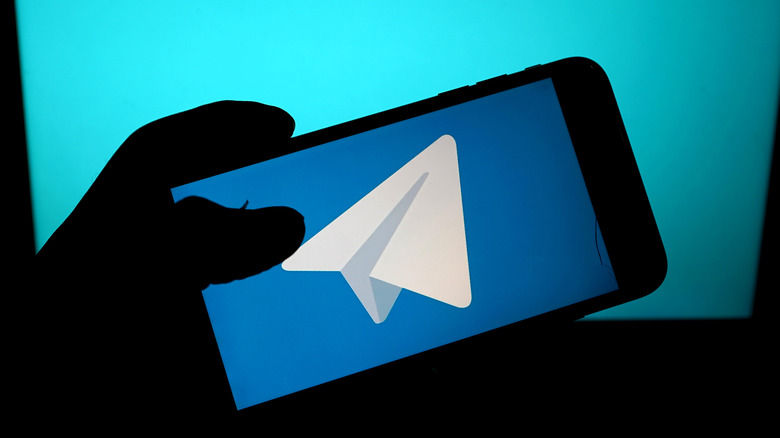 Telegram logo on smartphone screen