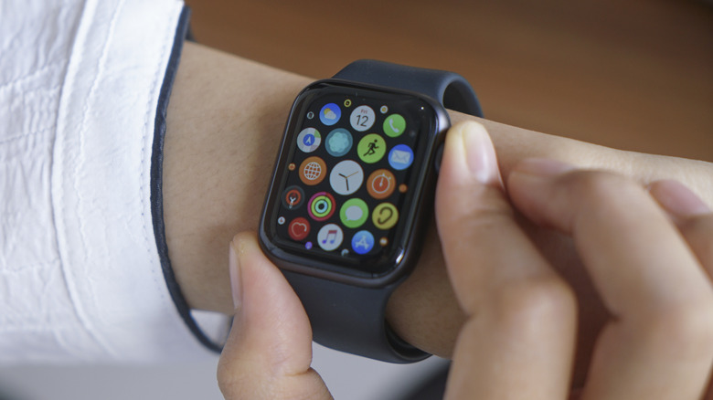 pressing the Digital Crown on Apple Watch