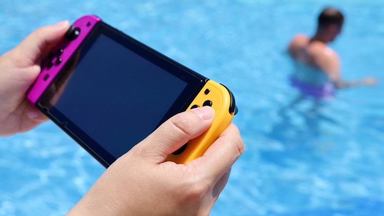 Nintendo Switch by the pool