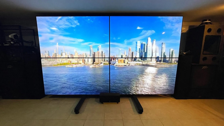 a 2x2 tv setup made out of 4 TCL 75 inch TVs