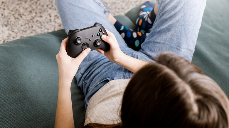woman playing xbox series x