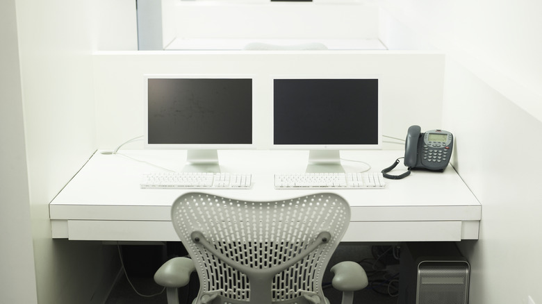 Two monitors on a desk