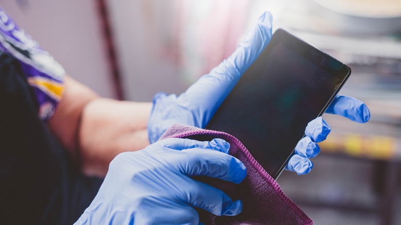 Cleaning phone with microfiber cloth