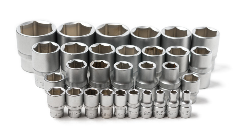 Metal wrench sockets lined up