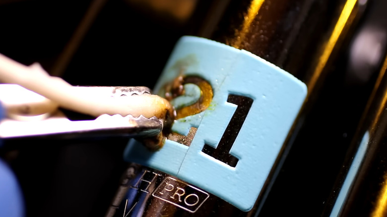 Etching a number onto a metal socket