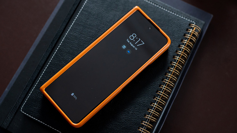 Samsung Galaxy Z Fold 4 in a case on a diary