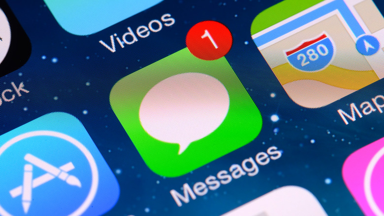 Messages app icon on iPhone screen
