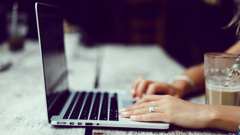 Woman using a Macbook