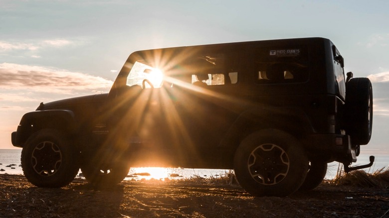Silhouette of a Jeep in sundown