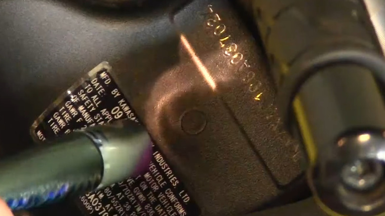 Flashlight used to check VIN of a Kawasaki Sports Bike