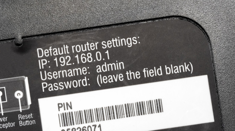Router sticker showing default router settings