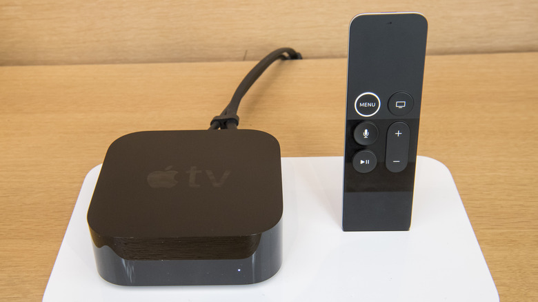Apple TV 4K on display next to a Siri Remote