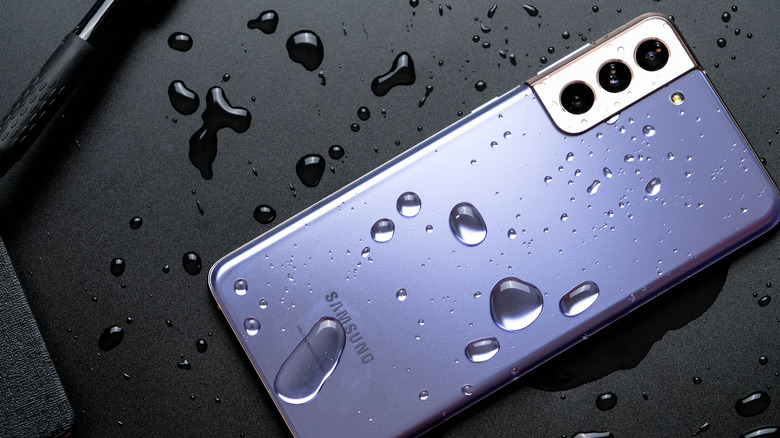 samsung smartphone with water drops