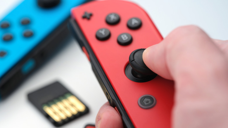 Holding a Joy-Con
