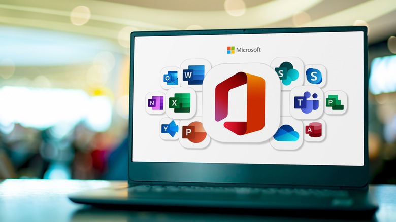 Office app icons on a laptop screen