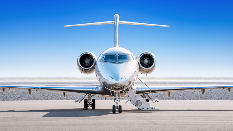 A private jet on the tarmac ready for boarding