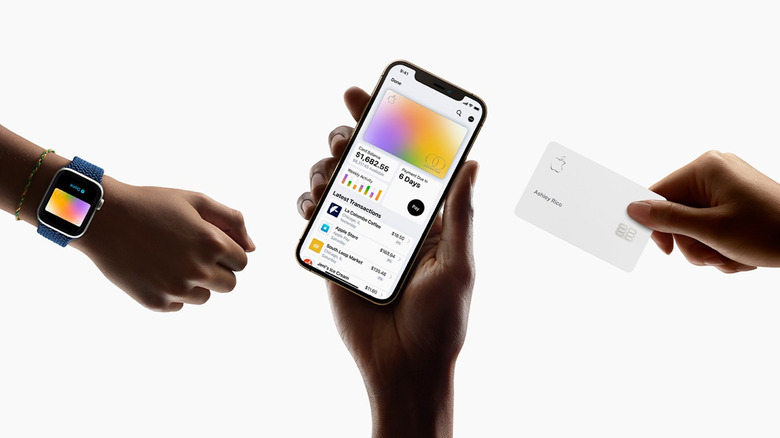 person holding apple card