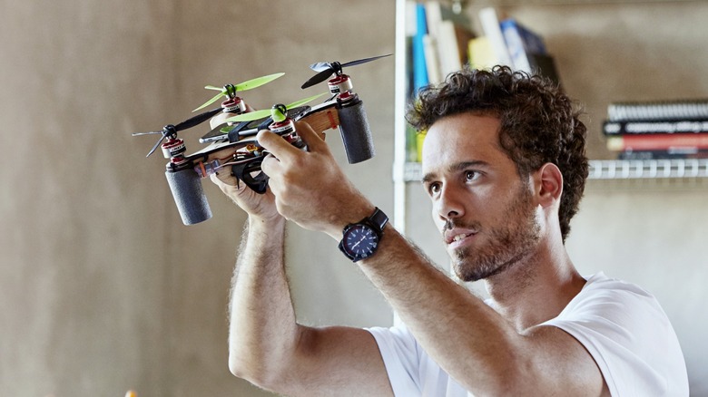 Man working on a DIY drone