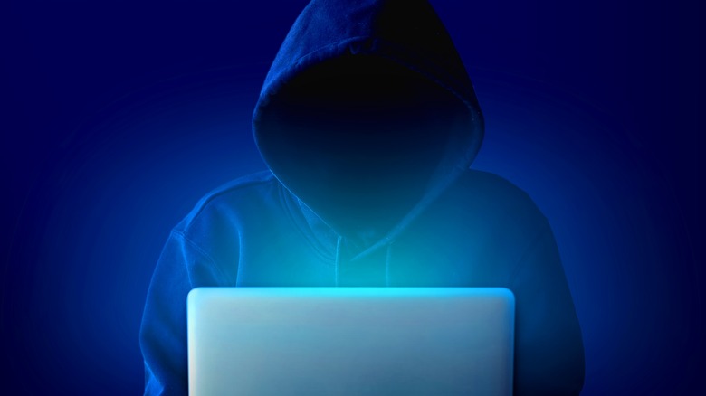 Anonymous user in front of laptop