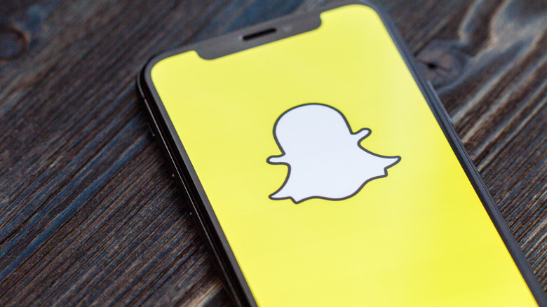 phone with Snapchat logo