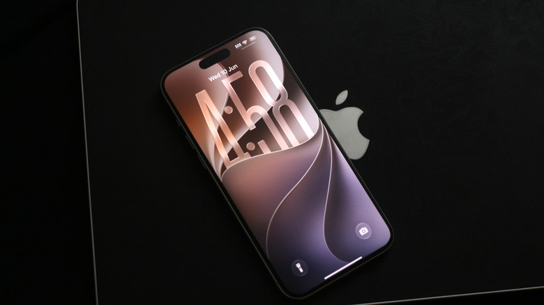 iPhone with the new iOS 27 wallpaper.