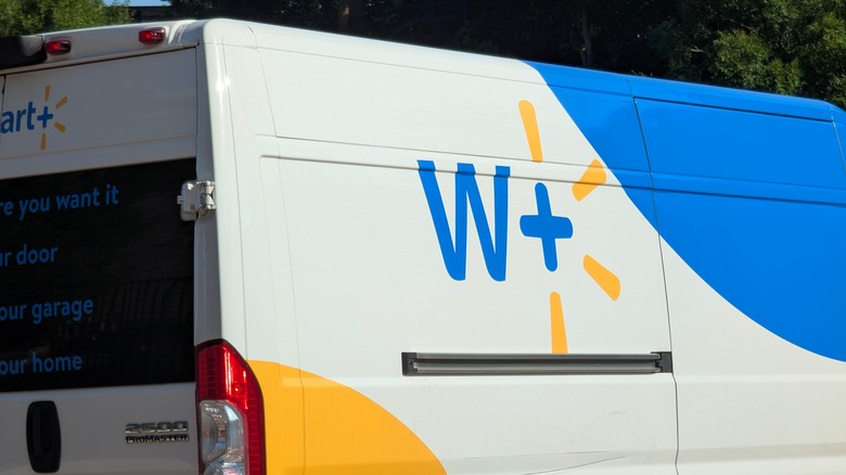 Delivery van displaying Walmart+ logo on the side