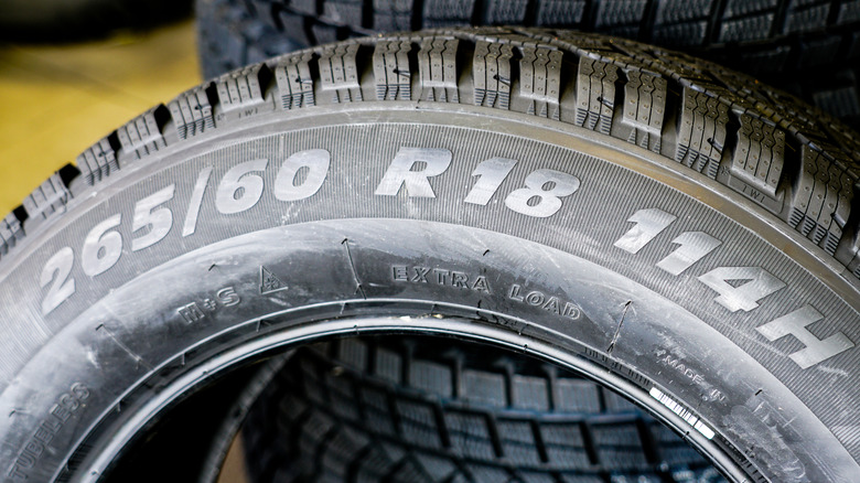 tire showing tread and sidewall size and load/speed ratings