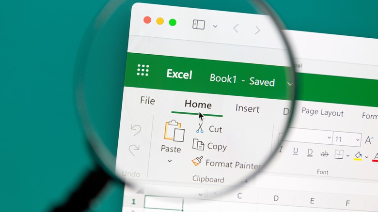 Excel spreadsheet viewed though magnifying glass