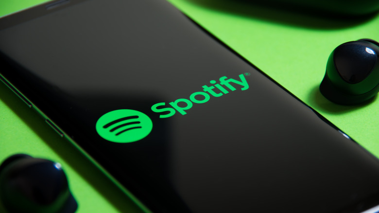 Phone displaying Spotify logo