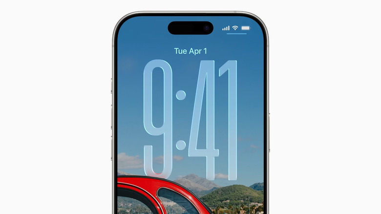 iPhone showing lock screen with car and big clock