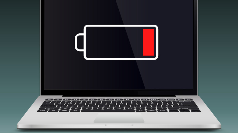 A laptop with low battery sign