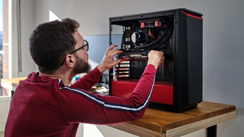 Man installing GPU
