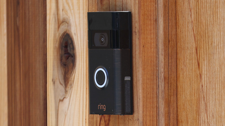 Ring doorbell on wooden door