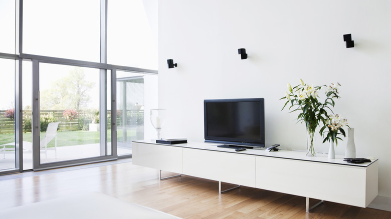 A TV kept directly in front of a large window