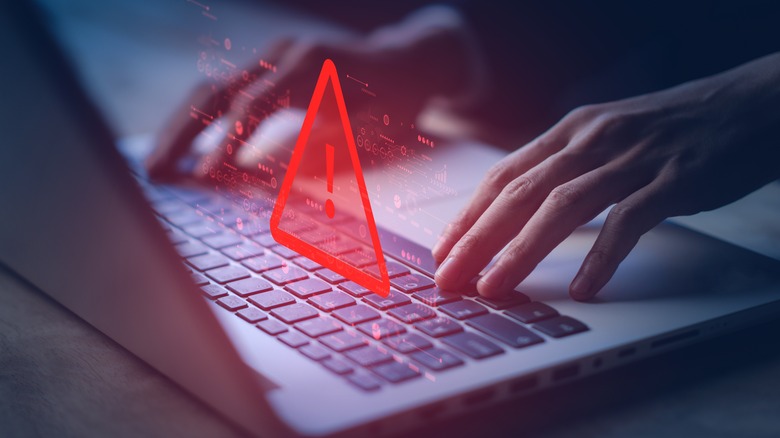 laptop with warning message illustration