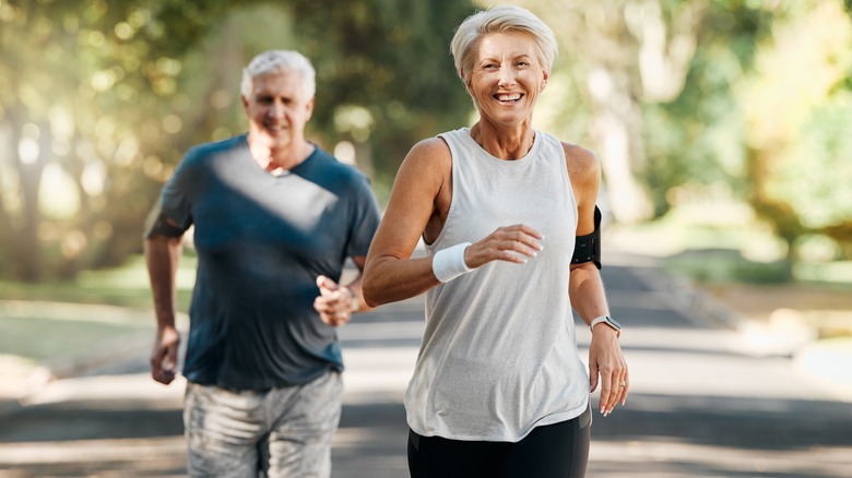 a man and woman jogging