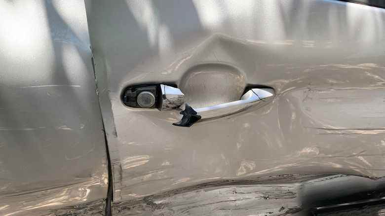 Car door handle broken after crash